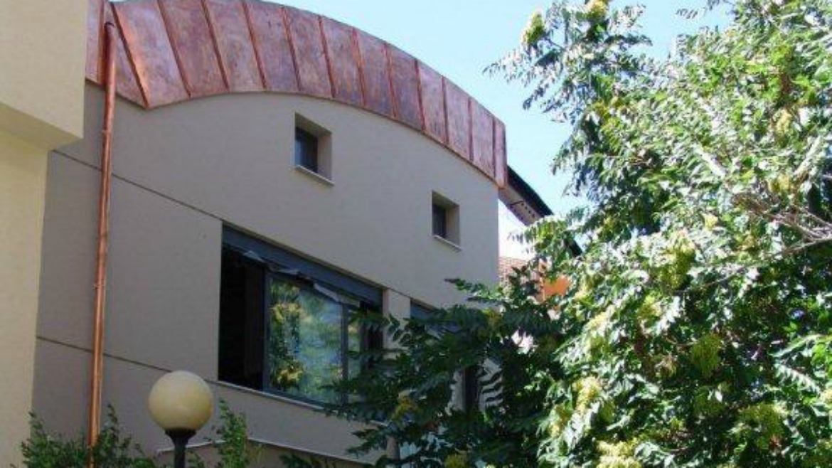 ADDITION OF A NEW FLOOR AND STRENGTHENING OF AN EXISTING TWO-STOREY BUILDING WITH A BASEMENT