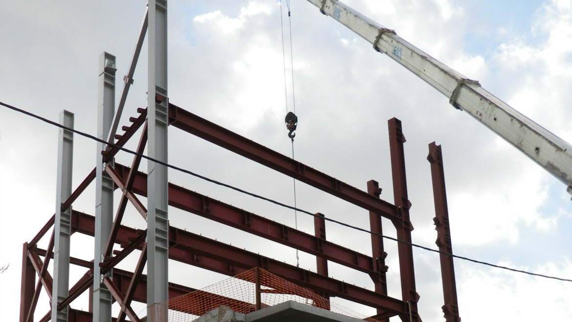 ADDITION OF 3 STORIES TO AN EXISTING SINGLE-STORY BUILDING IN GAZI, ATHENS